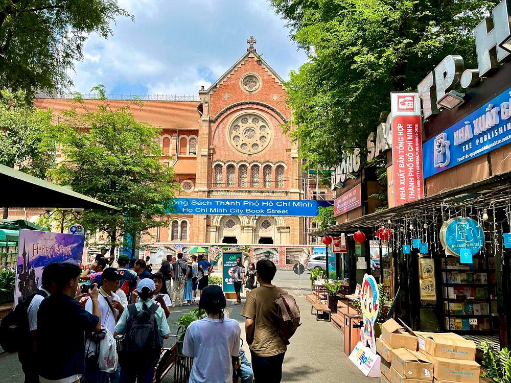 Visitors leisurely stroll past the book stalls, immersing themselves in a world of knowledge